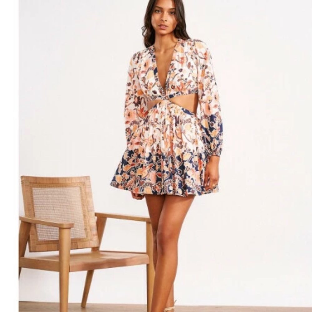 Chelsea & Violet Deep V-Neck Long Sleeve Cut-Out Waist Batik Print Mini Dress